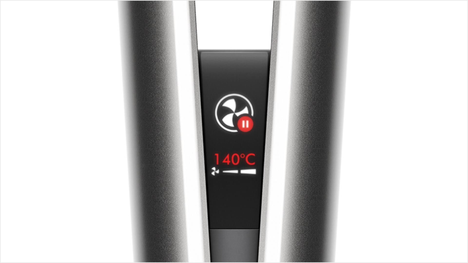 תקריב מסך ה-LCD של Dyson Airstrait, מראה את האנימציה של ההשהיה האוטומטית.