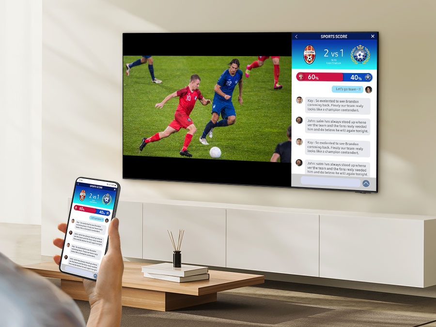 טלוויזיה SAMSUNG QE75Q60D: Multi View - צפייה במספר תכנים בו-זמנית על מסך גדול! בתמונה זו רואים טלוויזיה חכמה SAMSUNG 75 אינץ' דגם QE75Q60D QLED 4K HDR. טלוויזיה זו מצוידת בטכנולוגיית Multi View, המאפשרת לך לצפות במספר תכנים בו-זמנית על גבי מסך הטלוויזיה הגדול.